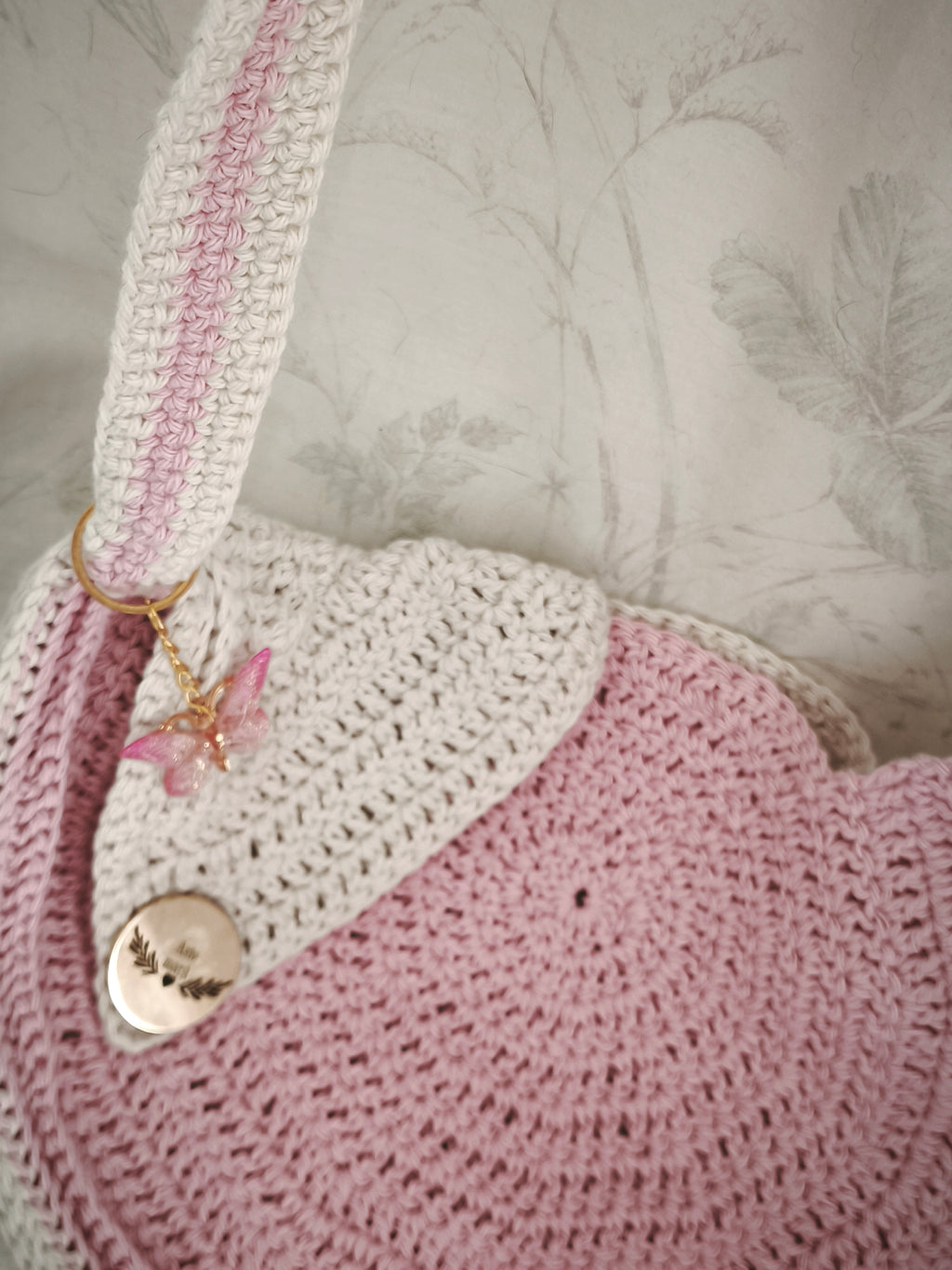 Pink and cream circle messenger bag