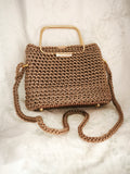Small gold handle handbag