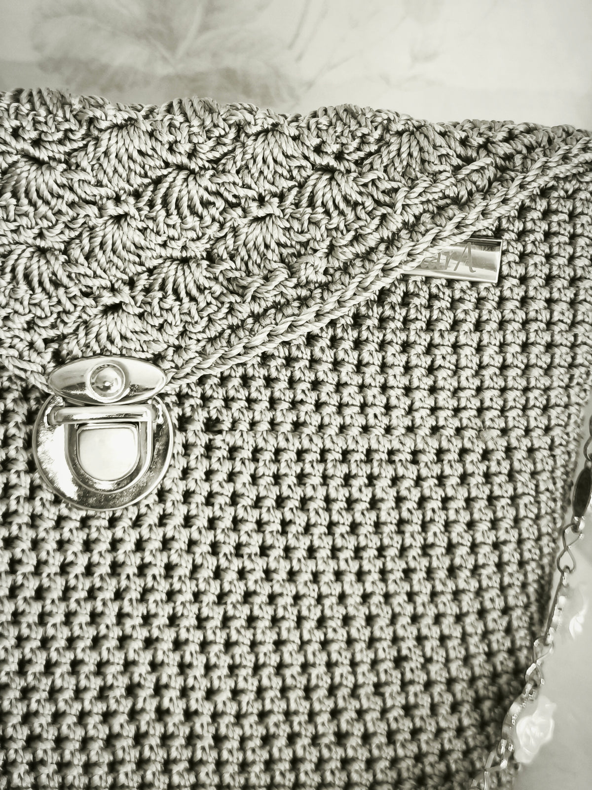 Silver h rose handbag
