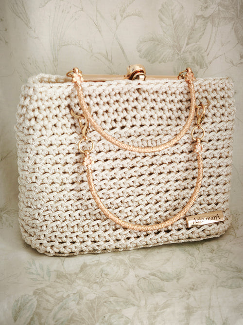 Cream golden handbag clutch