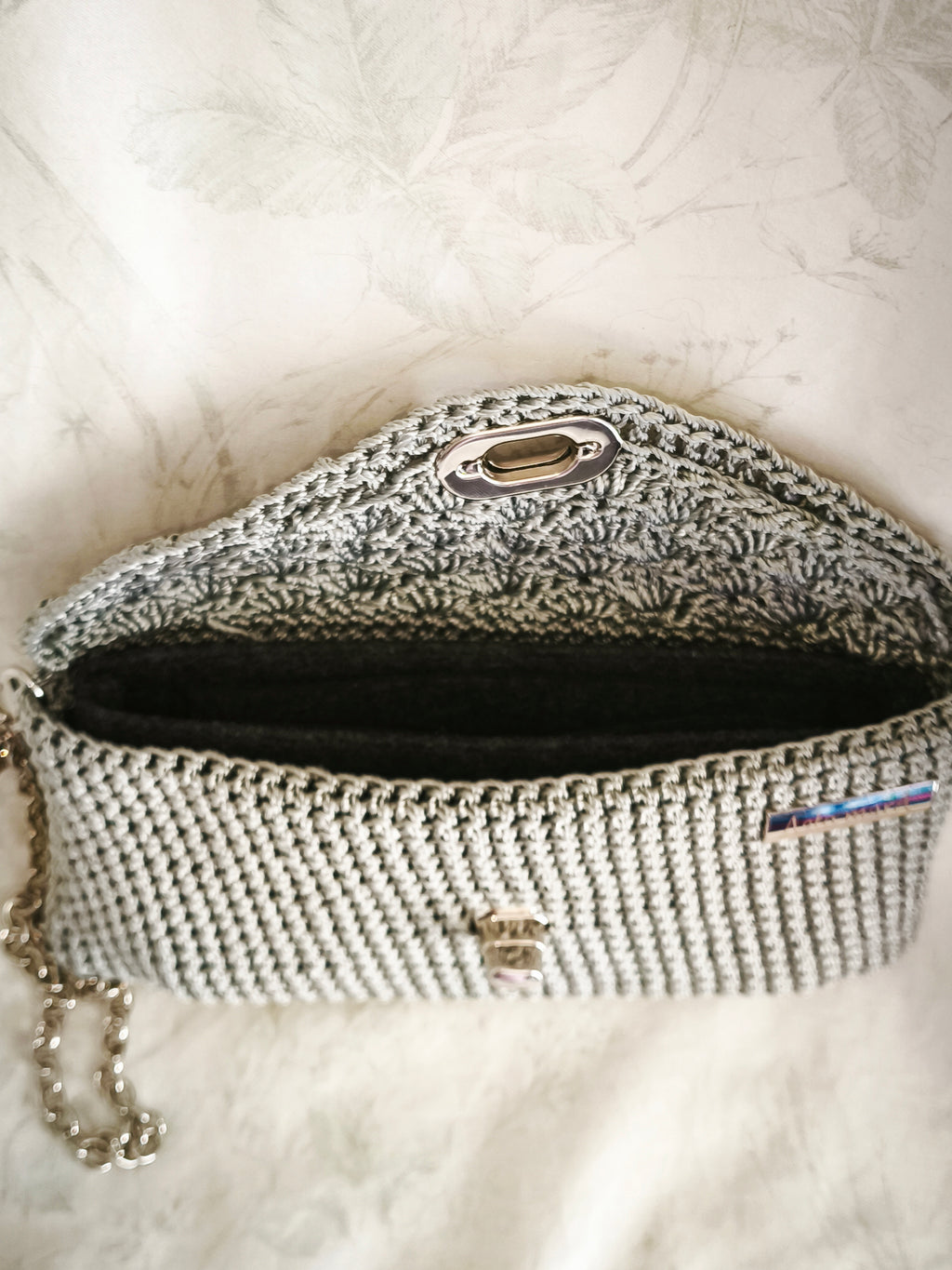 Silver clutch