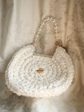 Round white handbag