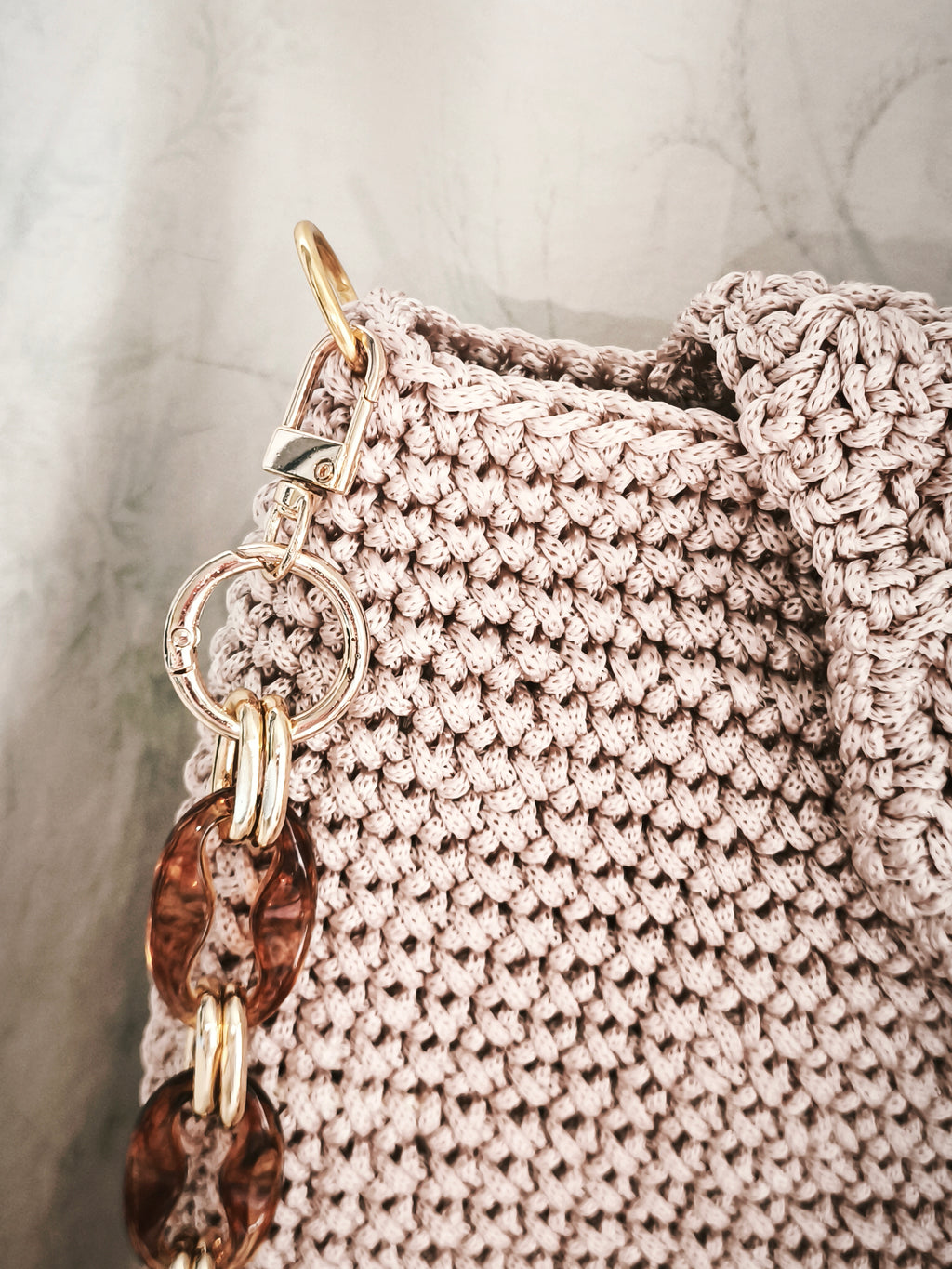 Light gold bag with long shoulder strap