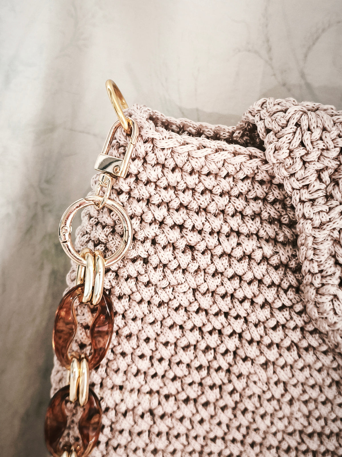 Light gold bag with long shoulder strap