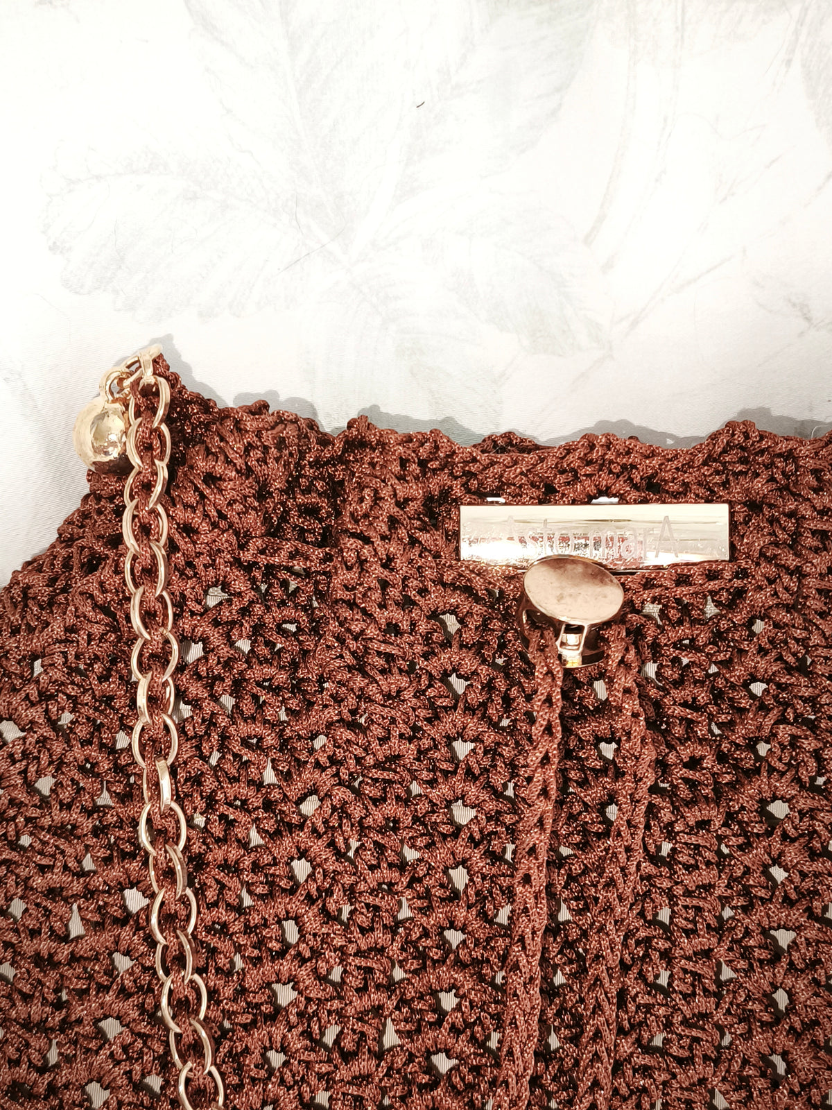 Small golden brown shoulder bag