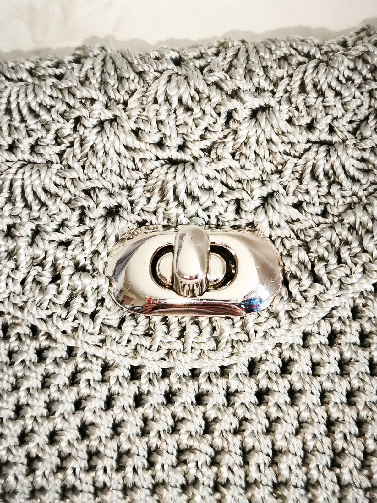 Silver clutch