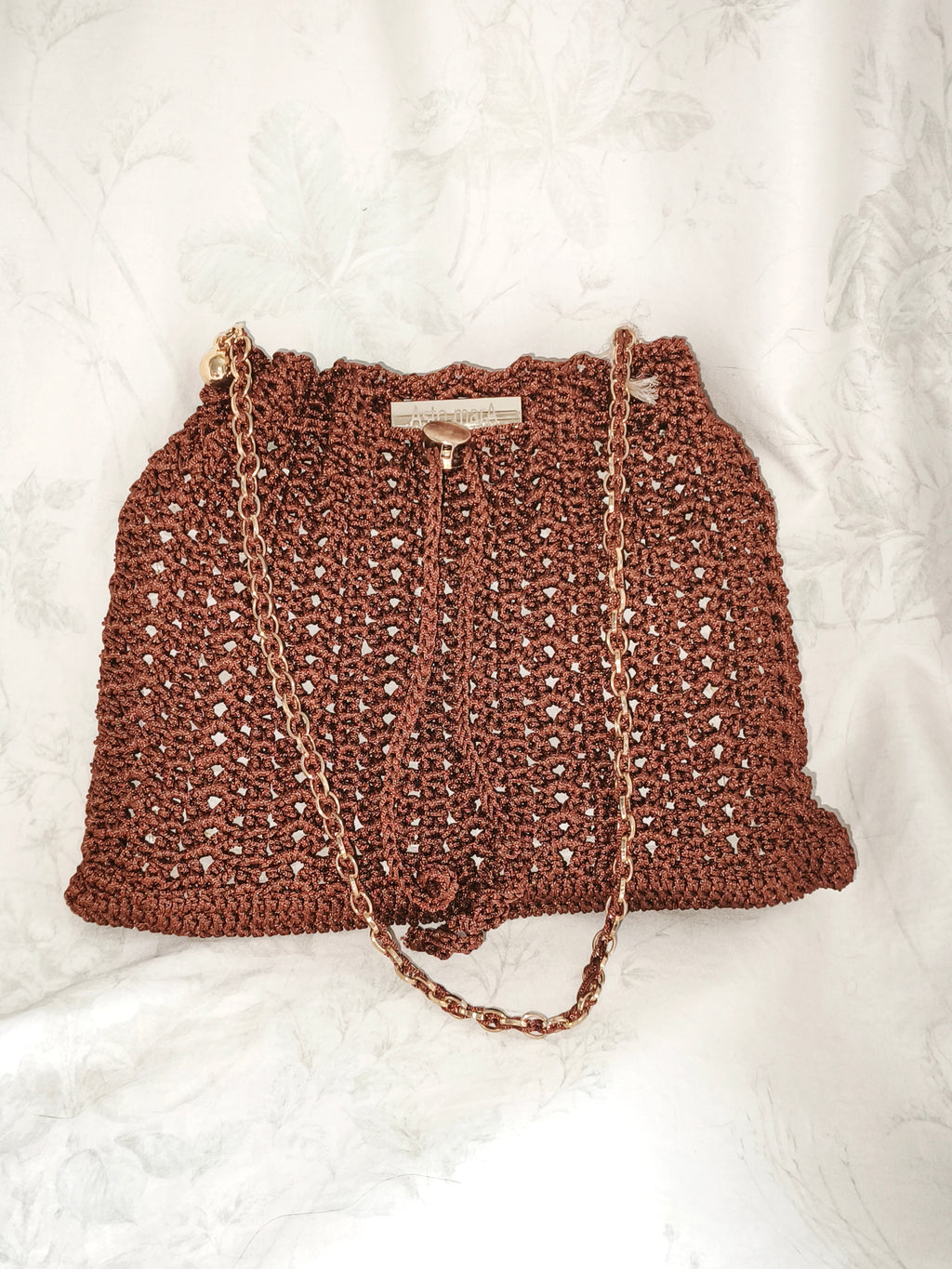 Small golden brown shoulder bag