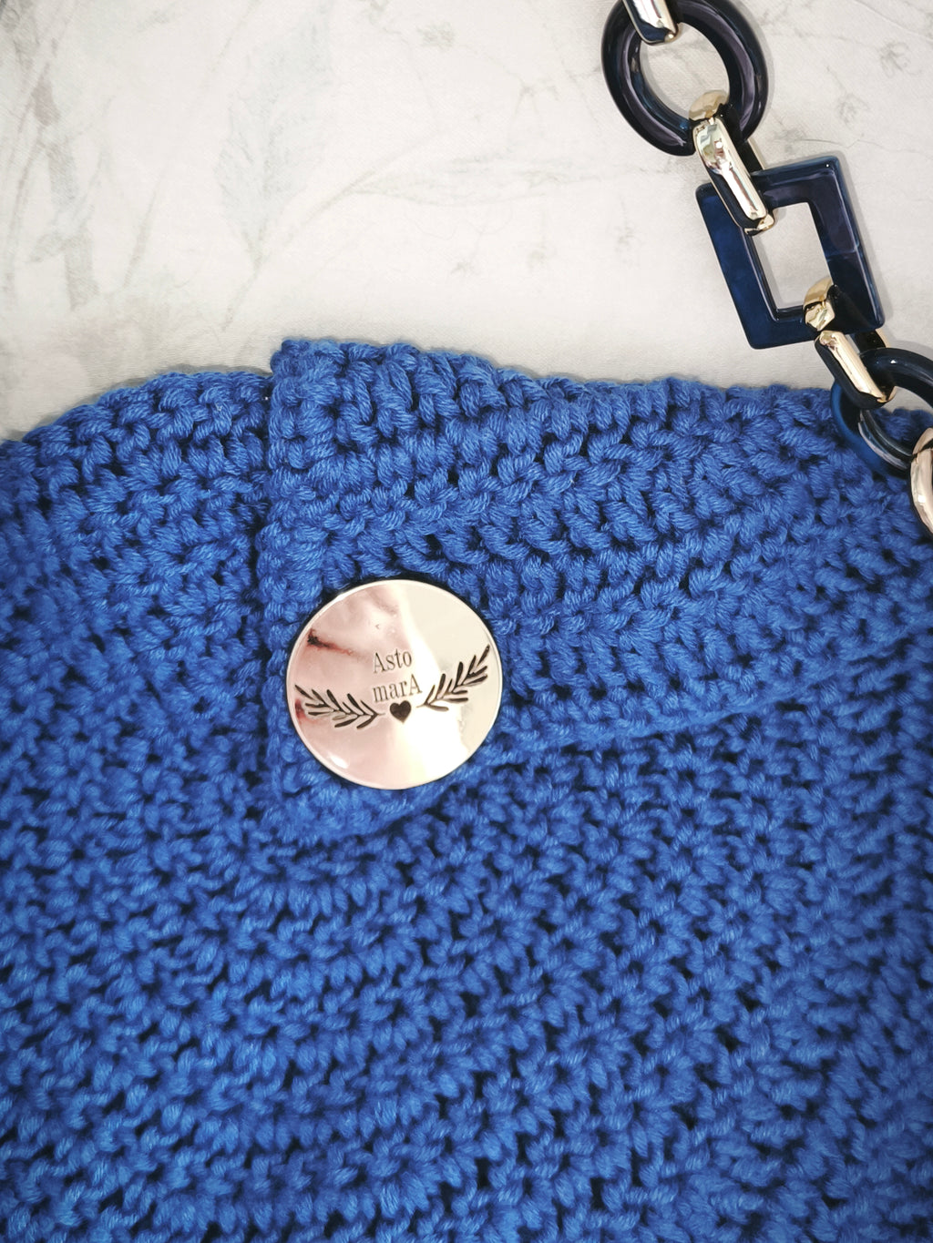 Small blue shoulder bag