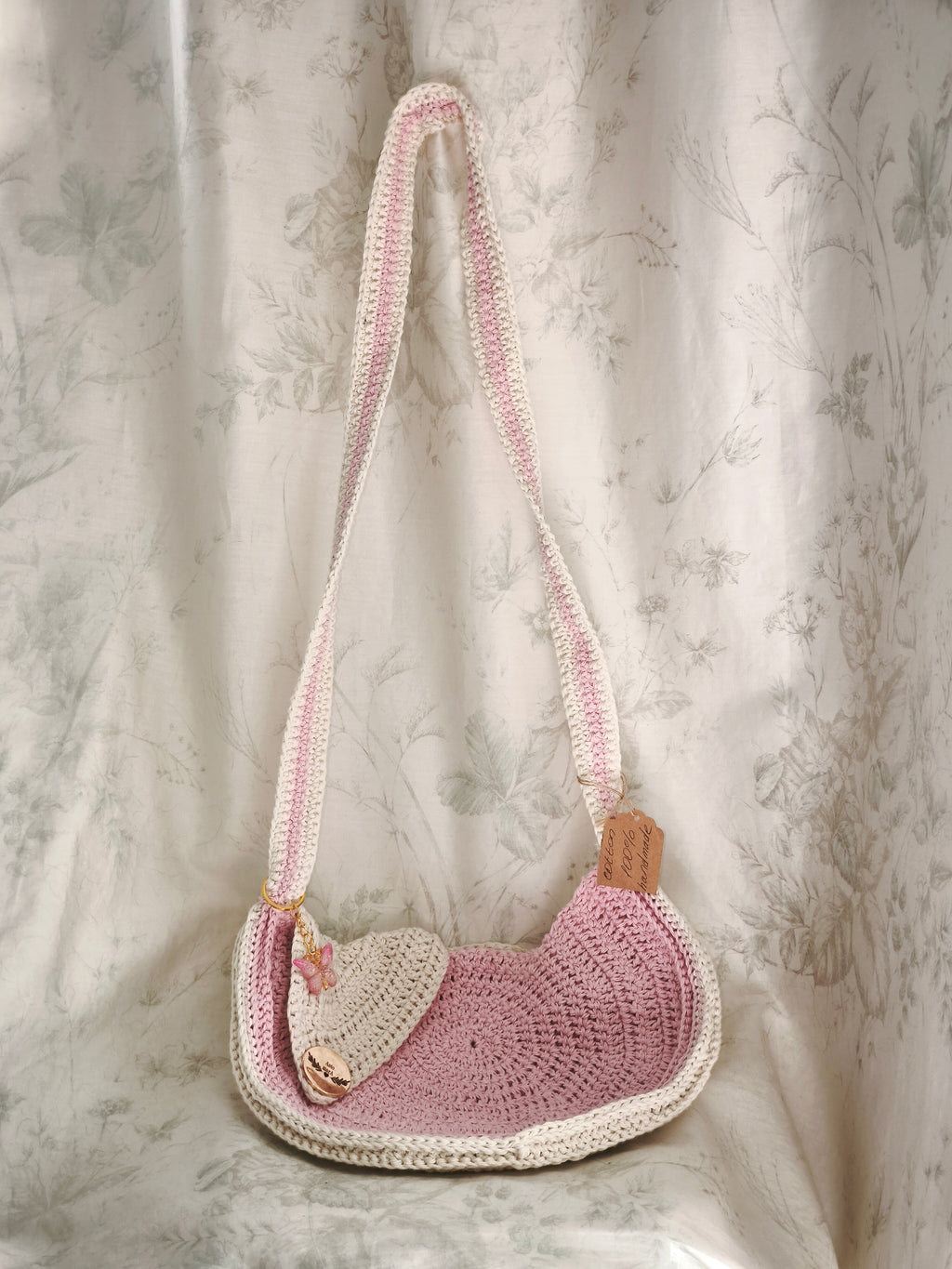Pink and cream circle messenger bag