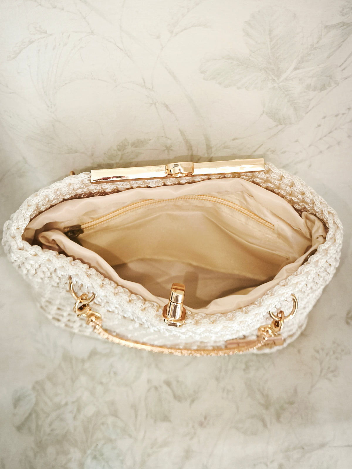 Cream golden handbag clutch