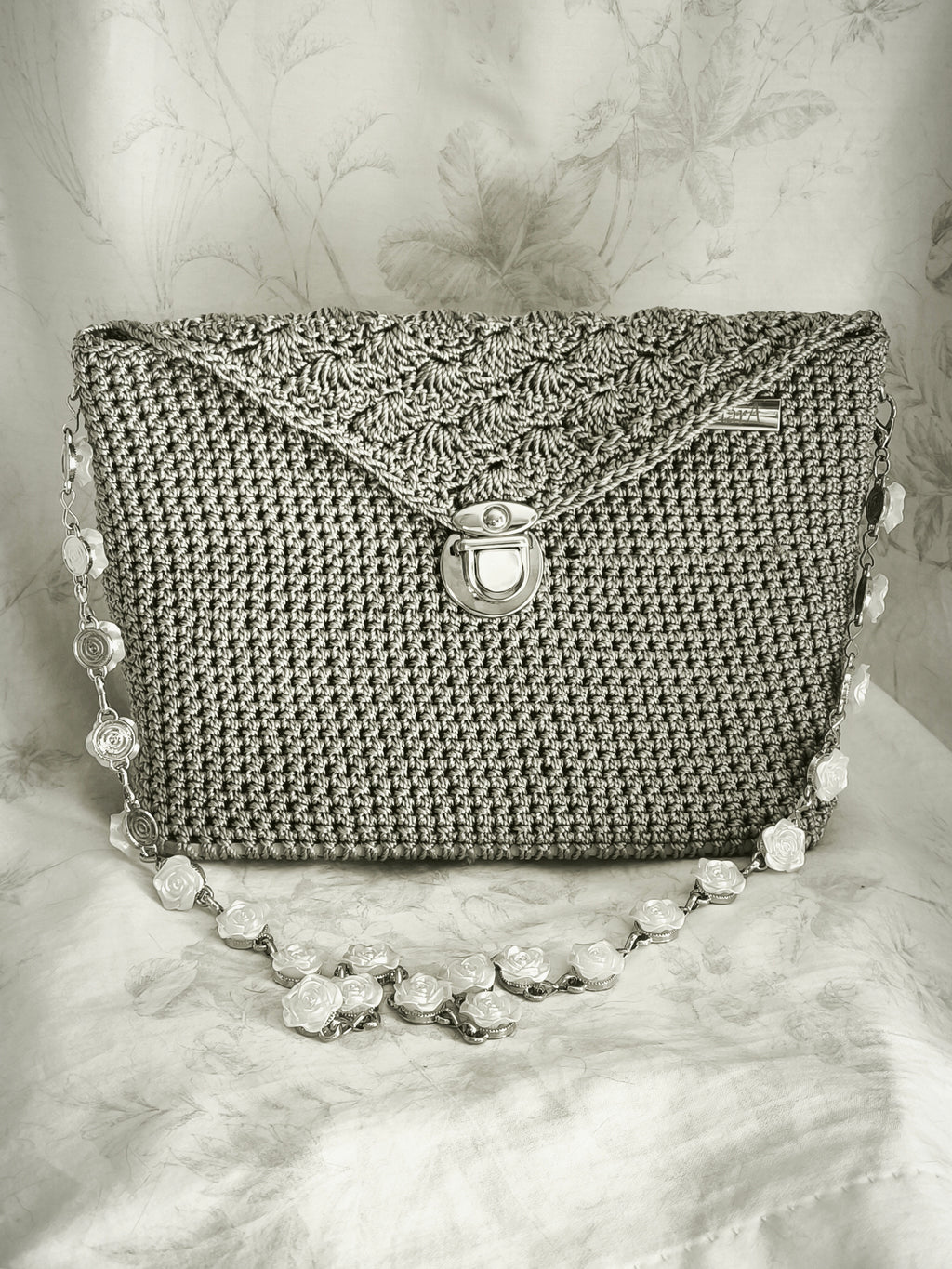 Silver h rose handbag