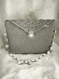 Silver h rose handbag
