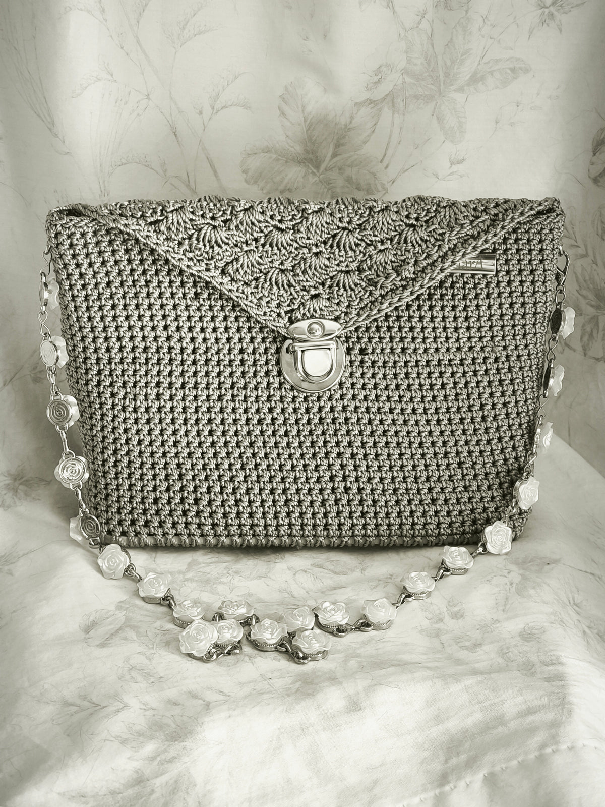 Silver h rose handbag